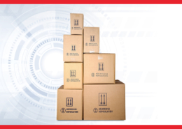 Stacked cardboard shipping boxes displaying UN packaging symbols