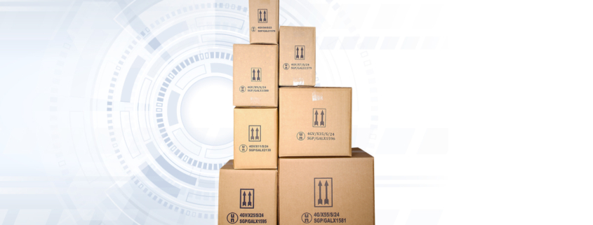 Stacked cardboard shipping boxes displaying UN packaging symbols